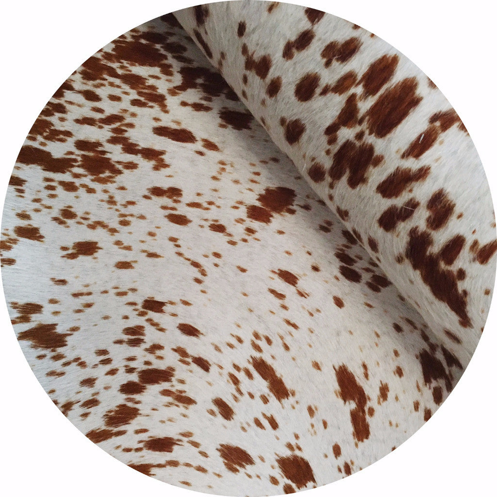 Limited Edition White Tortoise Cowhide Rug | East Coast Leather